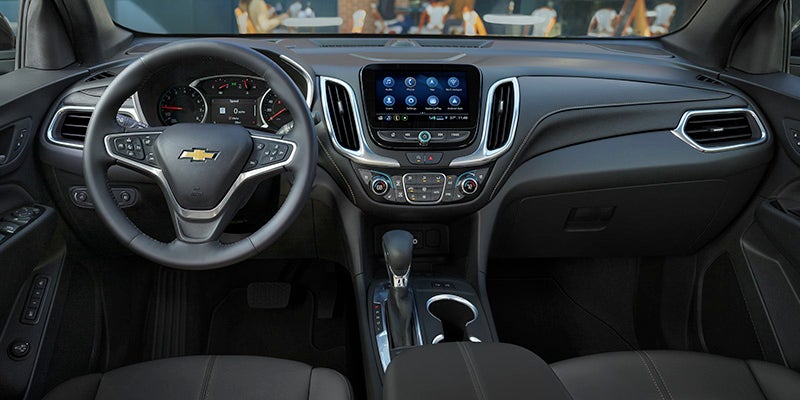A Chevrolet Equinox highlighting its advanced interior with modern infotainment and connectivity features