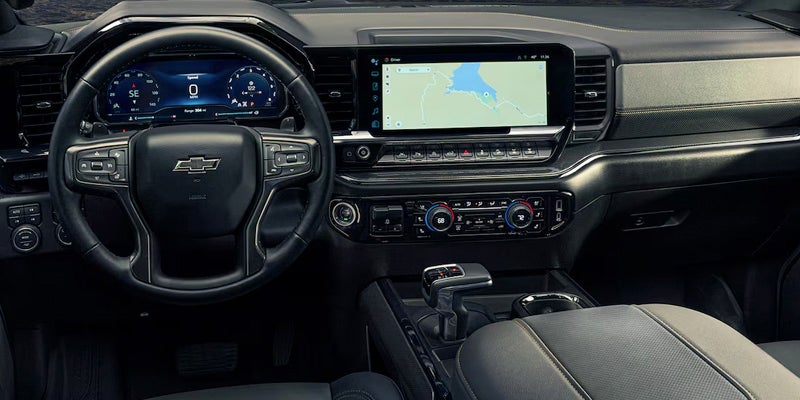 Chevy Silverado 1500 highlighting its advanced interior with modern infotainment and connectivity features