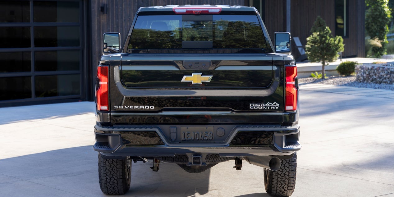Silverado 2500 HD stands parked, showcasing its rear view with bold and rugged features